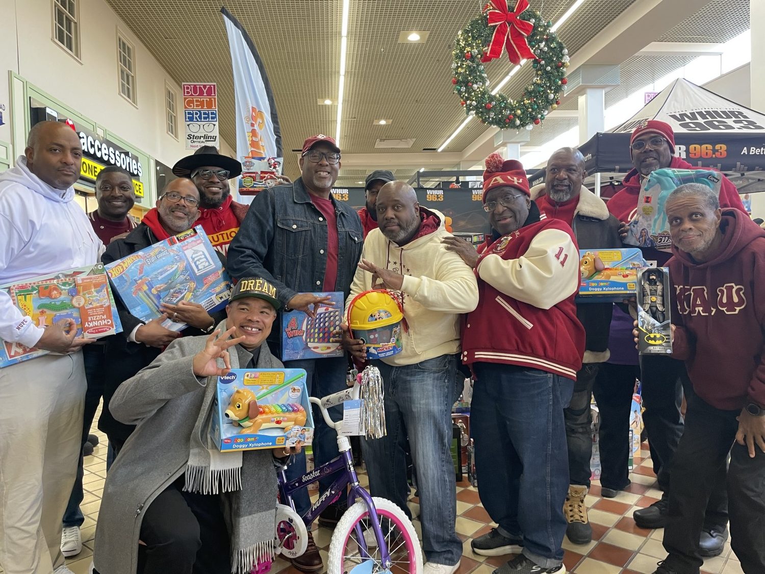 Brothers of Kappa Alpha Psi donating at WHUR Toy drive