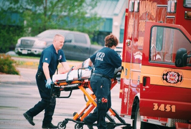 stock-photo-emergency-serious-stretcher-rescue-emergency-services-medical-ambulance-medics-911-23f70673-935d-466a-b98f-e6da9912b9a4