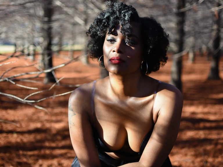 black woman reflection depression sadness_createherstock