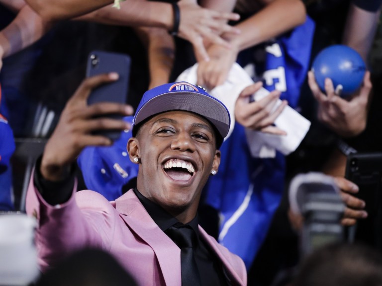 RJ Barrett poses for selfies with fans after he was selected by the New York Knicks at the NBA basketball draft_Ap Images
