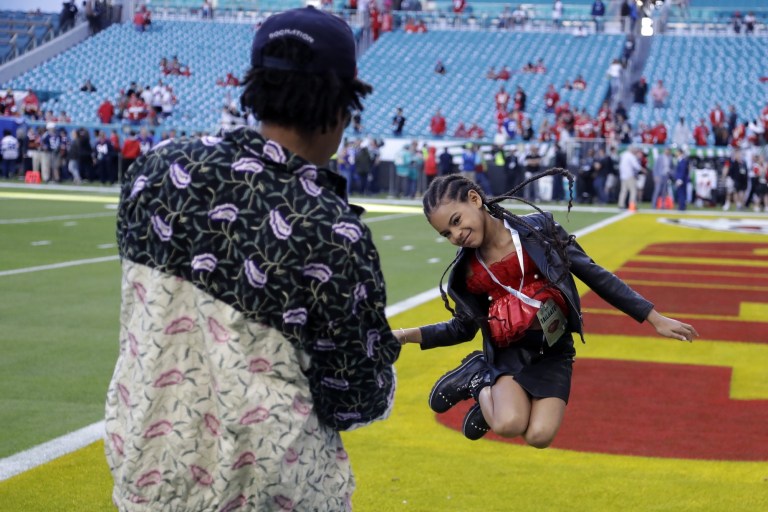 Beyoncé, Jay-Z Sit During National Anthem At Super Bowl