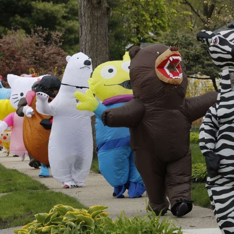 Detroit Residents Lift Spirits With Costumed Parades