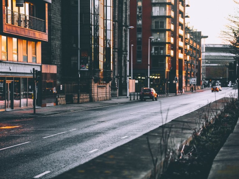photography-of-roadway-near-buildings-933969