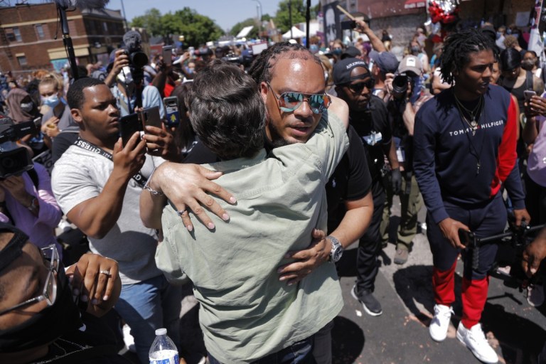 Protesters Express Cautious Optimism