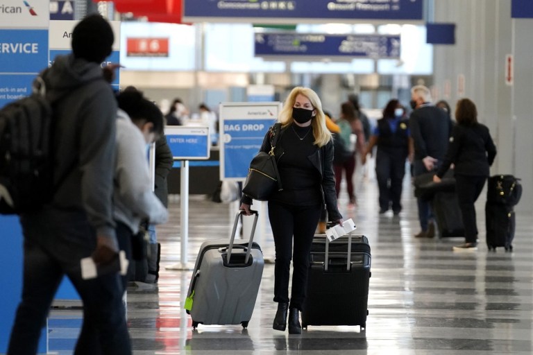 Holiday Air Travel Surges Despite Dire Health Warnings