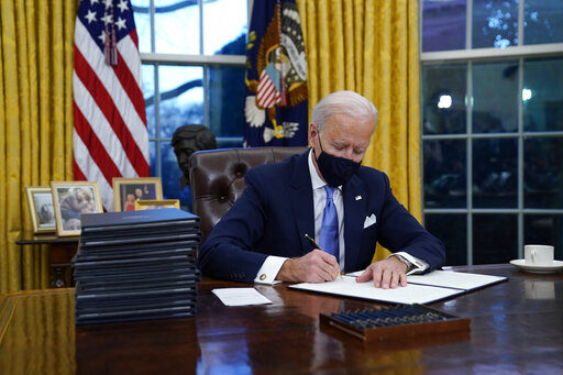 Day One: Biden Reverses Trump Policies With Executive Orders