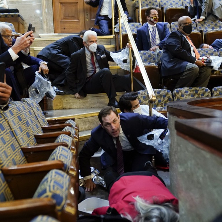 Pro-Trump Rioters Storm U.S. Capitol