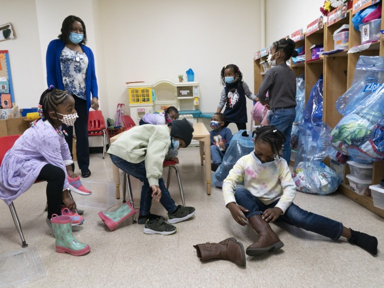 Virus_Outbreak_children kids_masks_AP Images