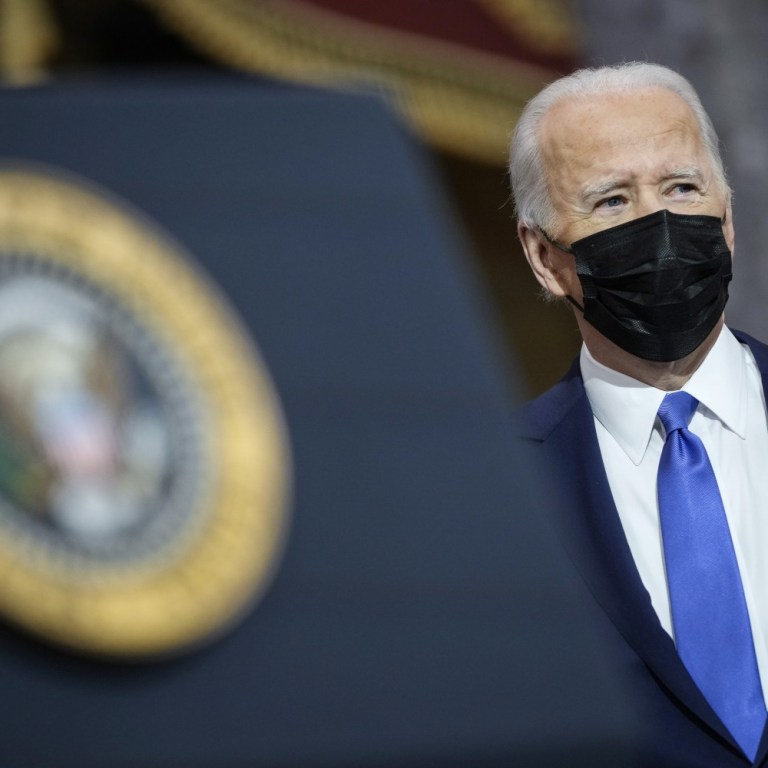 Biden Decries Trump Backers’ ‘dagger at throat’ of Democracy